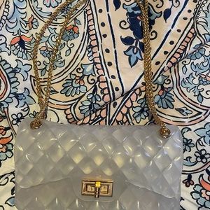 Clear and gold handbag from Fashion Nova